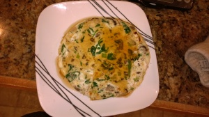 Bacon, Mushroom, Spinach, Green Onion, and Cream Cheese Frittata. Topped with syrup.