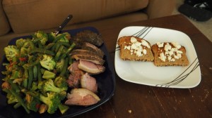 Sous Vide leg of lamb with Asian veggies and two slices of bread with reduced fat feta cheese.